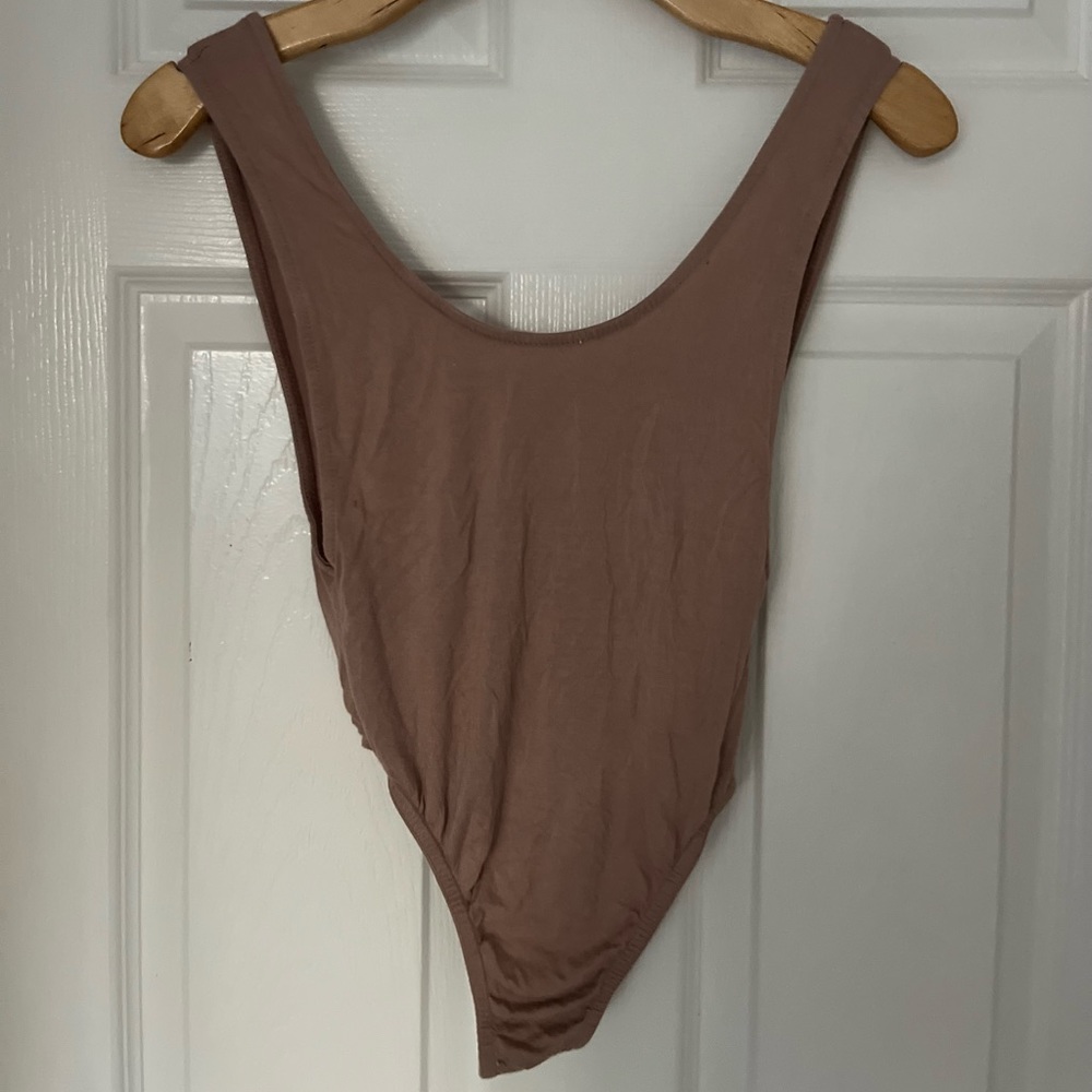 Small Missguided bodysuit. Warm colour.  Soft fabric.